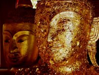 The actual Buddha image is behind - but you can rub gold leaf on a replica image