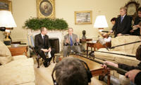 President George W. Bush is joined in the Oval Office by Macedonian Prime Minister Vlado Buckovski Wednesday, Oct. 26, 2005, for a photo availability. The President welcomed Prime Minister Buckovski and thanked him for his country's strong support in the war on terror.  White House photo by Eric Draper