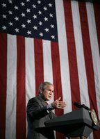 President George W. Bush addresses a news conference at the Museum of Science and Industry in Chicago, Friday, July 7, 2006, speaking on the economy, immigration reform and security issues. White House photo by Eric Draper 