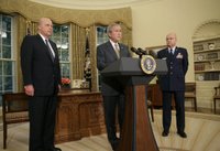 President George W. Bush announces his nomination of Gen. Michael V. Hayden as the next Director of the Central Intelligence Agency Monday, May 8, 2006, in the Oval Office as Ambassador John Negroponte, Director of National Intelligence, looks on. Said the President of Gen. Hayden: 'He's the right man to lead the CIA at this critical moment in our nation's history.' White House photo by Paul Morse.