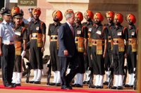 President George W. Bush participates in the troop review Thursday, March 2, 2006, during the arrival ceremony at Rashtrapati Bhavan in New Delhi. White House photo by Paul Morse.