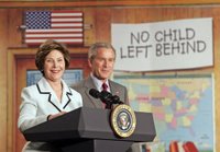 Laura Bush and President Bush discuss 'No Child Left Behind,' at North Glen Elementary School in Glen Burnie, Md., Monday, Jan. 9, 2006. 'Interestingly enough, in 2003, 45 percent of the African American students in this school rated proficient in reading; in 2005, 84 percent are proficient. In other words, this is a school that believes every child can learn. Not just certain children, every child,' said the President. White House photo by Kimberlee Hewitt