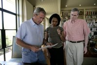 President George W. Bush meets with Secretary of State Condoleezza Rice and National Security Advisor Stephen Hadley at the Bush Ranch to discuss the Middle East, Saturday, Aug. 5, 2006. White House photo by Eric Draper.