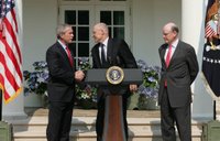 President George W. Bush shakes the hand of Henry Paulson after nominating him Tuesday, May 30, 2006, as Treasury Secretary to replace Secretary John Snow, right, who announced his resignation. White House photo by Shealah Craighead.