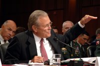 Secretary of Defense Donald H. Rumsfeld gestures to make his point as he testifies to the Senate Armed Services Committee on Iraq, Afghanistan and the war on terror during a hearing on Capitol Hill in Washington, D.C., on Aug. 3, 2006. Chairman of the Joint Chiefs of Staff Gen. Peter Pace, U.S. Marine Corps, and Commander, U.S. Central Command, Gen. John Abizaid, U.S. Army, joined Rumsfeld for the testimony. DoD photo by Staff Sgt. Hilliard, U.S. Army. (Released)   DoD photo by Staff Sgt. Hilliard, U.S. Army.