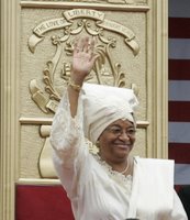 Liberian President Ellen Johnson Sirleaf waves to the audience at her inauguration in Monrovia, Liberia, Monday, Jan. 16, 2006. President Sirleaf is Africa's first female elected head of state. Mrs. Laura Bush and U.S. Secretary of State Condoleezza Rice attended the ceremony. White House photo by Shealah Craighead.