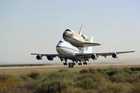 NASA's modified Boeing 747 Shuttle Carrier Aircraft with the Space Shuttle Discovery on top lifts off from Edwards Air Force Base to begin its ferry flight back to the Kennedy Space Center in Florida. NASA photo by Carla Thomas. + View high-res version