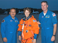  STS-114 Mission Specialists Charlie Camarda (left) and Steve Robinson (right) with Commander Eileen Collins at Kennedy's Shuttle Landing Facility Sunday morning after practice in the Shuttle Training Aircraft.