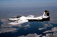 A T-37 Tweet aircraft from the 85th Fighter Training Squadron, Laughlin AFB, Texas, flies over Lake Amistad during a training mission. The T-37 Tweet is a twin-engine jet used for training undergraduate pilots, undergraduate navigator and tactical navigator students in fundamentals of aircraft handling, and instrument, formation and night flying. The twin engines and flying characteristics of the T-37 give student pilots the feel for handling the larger, faster T-38 Talon or T-1A Jayhawk later in the undergraduate pilot training course. The instructor and student sit side by side for more effective training. The cockpit has dual controls, ejection seats and a clamshell-type canopy that can be jettisoned. (Air Force photo by Staff Sgt. Andy Dunaway)