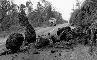 Photograph by Boone Morrison, Small landslide from spatter and cinder cone partially blocking, Chain of Craters Road, Hawaii Volcanoes National Park.