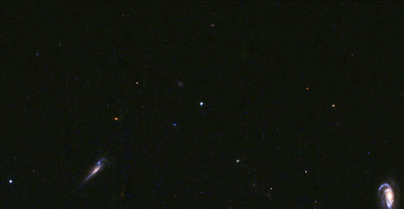 The afterglow of GRB 030329 (white dot in center of image), as detected on April 15, 2003, by the Advanced Camera for Surveys on the Hubble Space Telescope. Ohio State University astronomers and their colleagues recently used data from this event and three others to determine that a gamma ray burst is unlikely ever to occur in the Milky Way galaxy. Credit: The European Space Agency / NASA / Andrew Fruchter (STScI), Andrew Levan (Leicester Univ.), GOSH Collaboration.