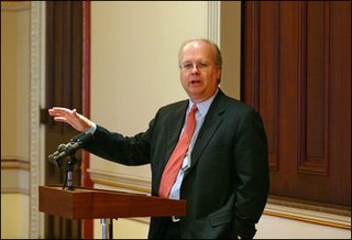 Karl Rove delivers remarks to the Summer 2004 White House Interns in the Dwight D. Eisenhower Executive Office Building, Aug. 3, 2004, uncredited White House photo.