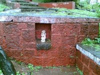 A small idol of the goddess, at the starting of the steps.