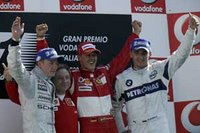 Formula One Italian Grand Prix, Michael Schumacher, Kimi Raikkonen and Kimi Raikkonen  on the podium.