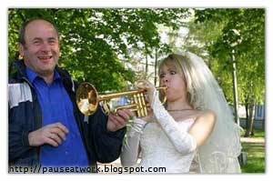 Bride blowing the trumpet