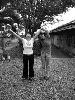 apple & i at the Palawan State University circa February 2005. that's me imitating the Oblation Statue of U.P. which symbolizes freedom.