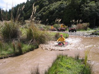 4 by 4 Quad bike in deep water