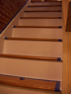 staircase taped for riser painting