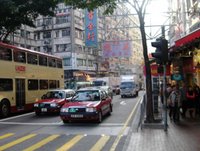 Click for big version. My neighborhood, busy street, Hong Kong.