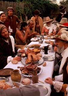 A reanactment of the first Thanksgiving is shown in this undated handout photo from Plimoth Plantation in Plymouth, Mass. According to food writer Linda Beaulieu, the first Thanksgiving did not include Turkey or some of the other food items associated with the holiday.  (AP Photo/Plimoth Plantation, Ted Curtin)