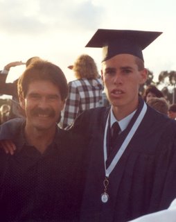 Noah and his father after High School Graduation