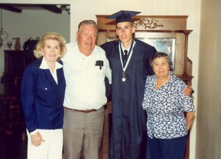 Noah and his Grandparents after High School Graduation