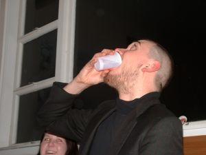 (photo of Rob skulling a Dixie cup of vodka)