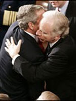 joe lieberman george bush kiss kissing iraq