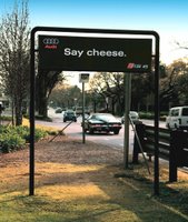 Car advertisement in front of a speed camera in South Africa