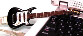 Mini-guitar flash drive.