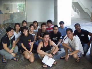 Group 5 photo, we didn't know how to stand for the shot, so everyone just squatted. (outside the library)