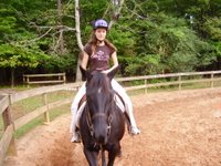 Emily riding a horse