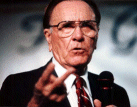 Oral Roberts - is he sticking two fingers up at his gullible audience, or perhaps the IRS?