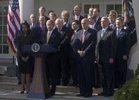 President George W. Bush stands with his Cabinet during a Rose Garden address to the media. 'As the new members of Congress and their leaders return to Washington, I've instructed my Cabinet to provide whatever briefings and information they need to be able to do their jobs,' said the President. 'The American people expect us to rise above partisan differences, and my administration will do its part.' White House photo by David Bohrer.