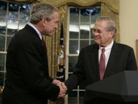 President George W. Bush shakes the hand of outgoing Secretary of Defense Donald Rumsfeld Wednesday, Nov. 8, 2006, in the Oval Office where the President announced the Secretary's resignation and his intention to nominate Dr. Robert Gates as successor. White House photo by Paul Morse,