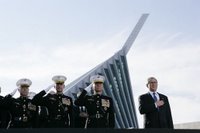 President George W. Bush joins, from left, U.S. Marine Corps Lt. Gen. James Amos; Chairman of the Joint Chiefs of Staff General Peter Pace and Commandant of the Marine Corps, General Michael Hagee, during the National Anthem at the dedication ceremony of the National Museum of the Marine Corps Friday, Nov. 10, 2006, in Quantico, Va. White House photo by Paul Morse.