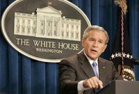 President George W. Bush emphasizes a point as he responds to a question Monday, Aug. 21, 2006, during a news conference at the White House Conference Center Briefing Room. He told the gathered media 'America is making a long-term commitment to help the people of Lebanon because we believe every person deserves to live in a free, open society that respects the rights of all.' White House photo by Paul Morse