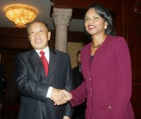 Secretary Rice With Chinese Foreign Minister Li Zhaoxing, Beijing, China, October 20, 2006, Secretary Rice shakes hands with Chinese Foreign Minister Li Zhaoxing in Beijing, China, October 20, 2006. Secretary Rice is traveling to Tokyo, Japan, Seoul,South Korea, Beijing, China and Moscow, Russia from October 17 to 22. State Department photo by Doug Kanter