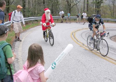 Image of Santa Claus on a bike