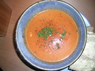 bowl of tomato, feennel and feta soup with a sprinkling of parsl;ey