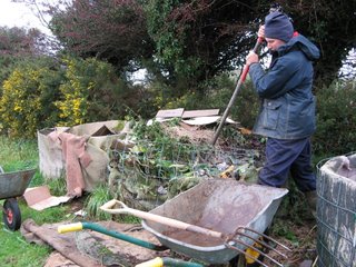 Poking holes through the completed heap to allow the air to circulate. This helps to avoid the heap becoming anaerobic