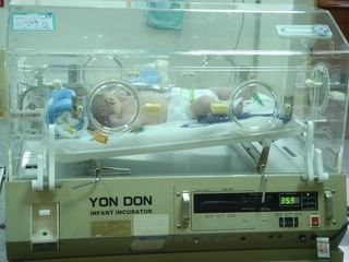 My nephew in an infant incubator.