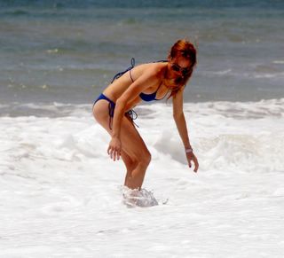 Lindsay Lohan in a blue bikini