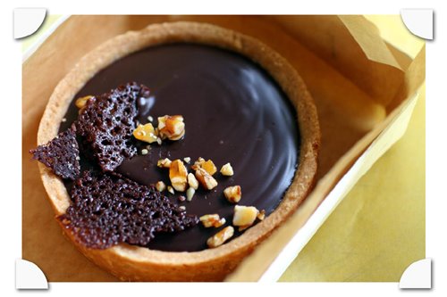 photograph picture of the harissa, almond and chocolate tart from boulettes larder in the ferry building plaza san francisco