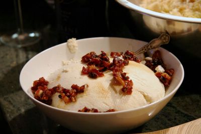 photograph picture of how to make homemade recipe for ricotta with caramelized bacon and a dribble of maple