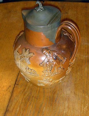 Jug showing stages of drunkenness