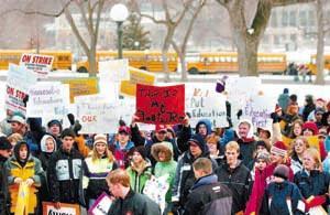 Demanding more money for Minnesota's public schools, nearly 6,000 parents, educators and students gathered at the Capitol steps Monday for one of the largest rallies in recent years. Pioneer Press photo