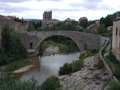 Bridge over the lOrbieu with the famous Abbaye in the background
