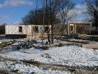 photo of house going up above the river floodplain January 15, 2005