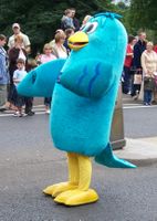 Person dressed up as blue bird